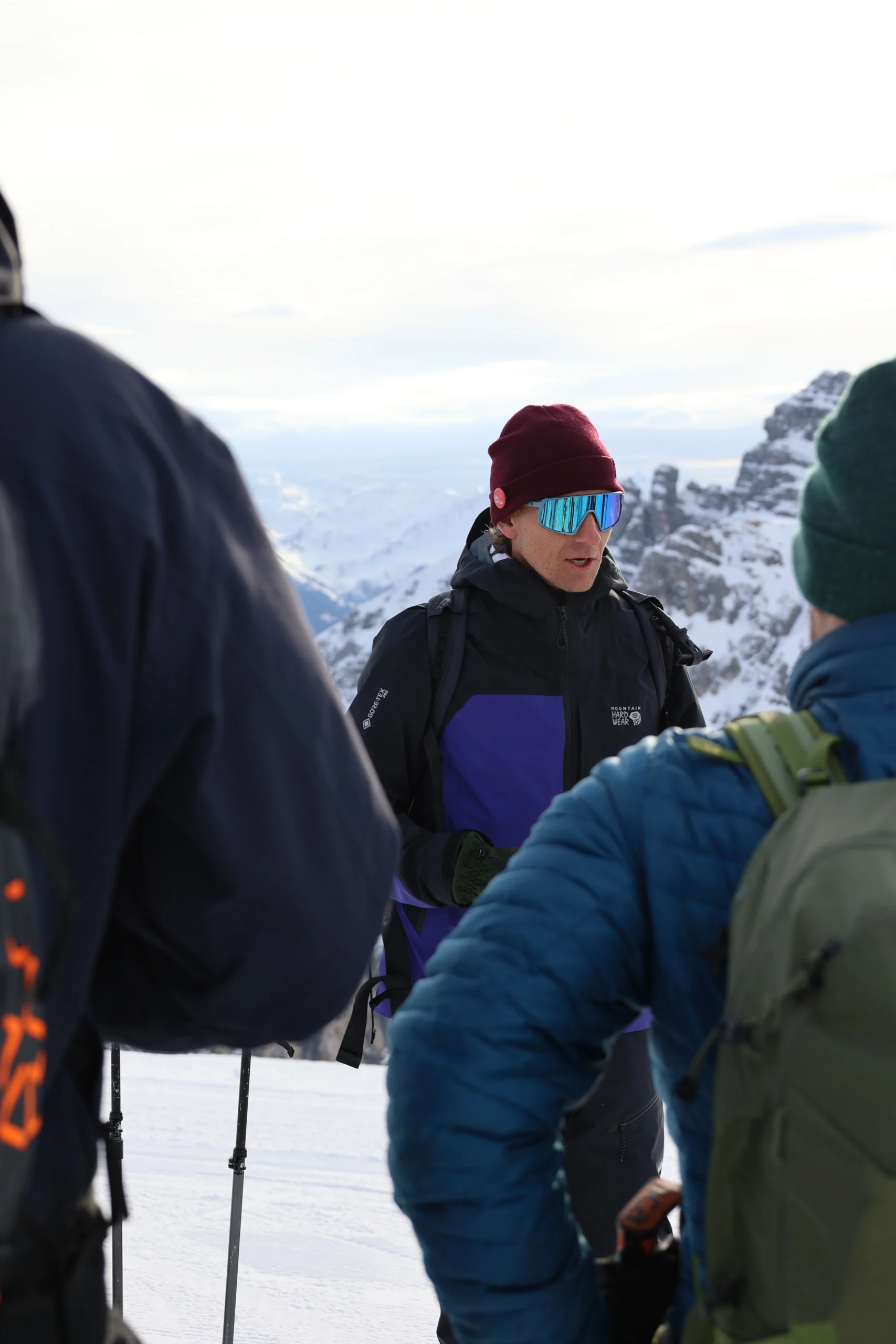 Ski tour group above the clouds